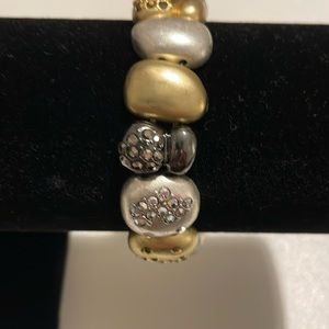 Gold and silver bracelet. 🌞